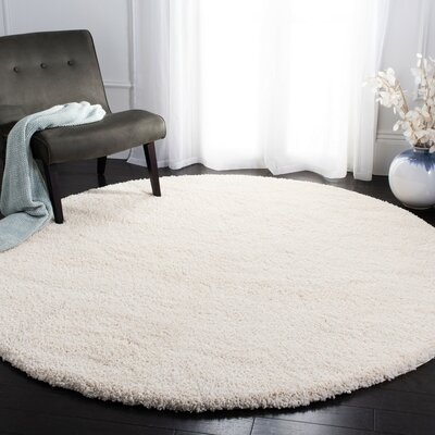 Mckeehan Ivory Area Rug - Image 0