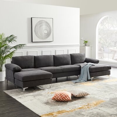 Aalam 52.3" Wide Reversible Corner Sectional with Ottoman - Image 0