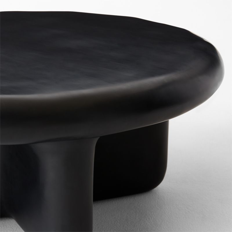 Bodene 36" Round Black Resin Coffee Table - Image 1