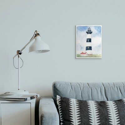 Black Striped Lighthouse With Quaint Cabin - Image 0
