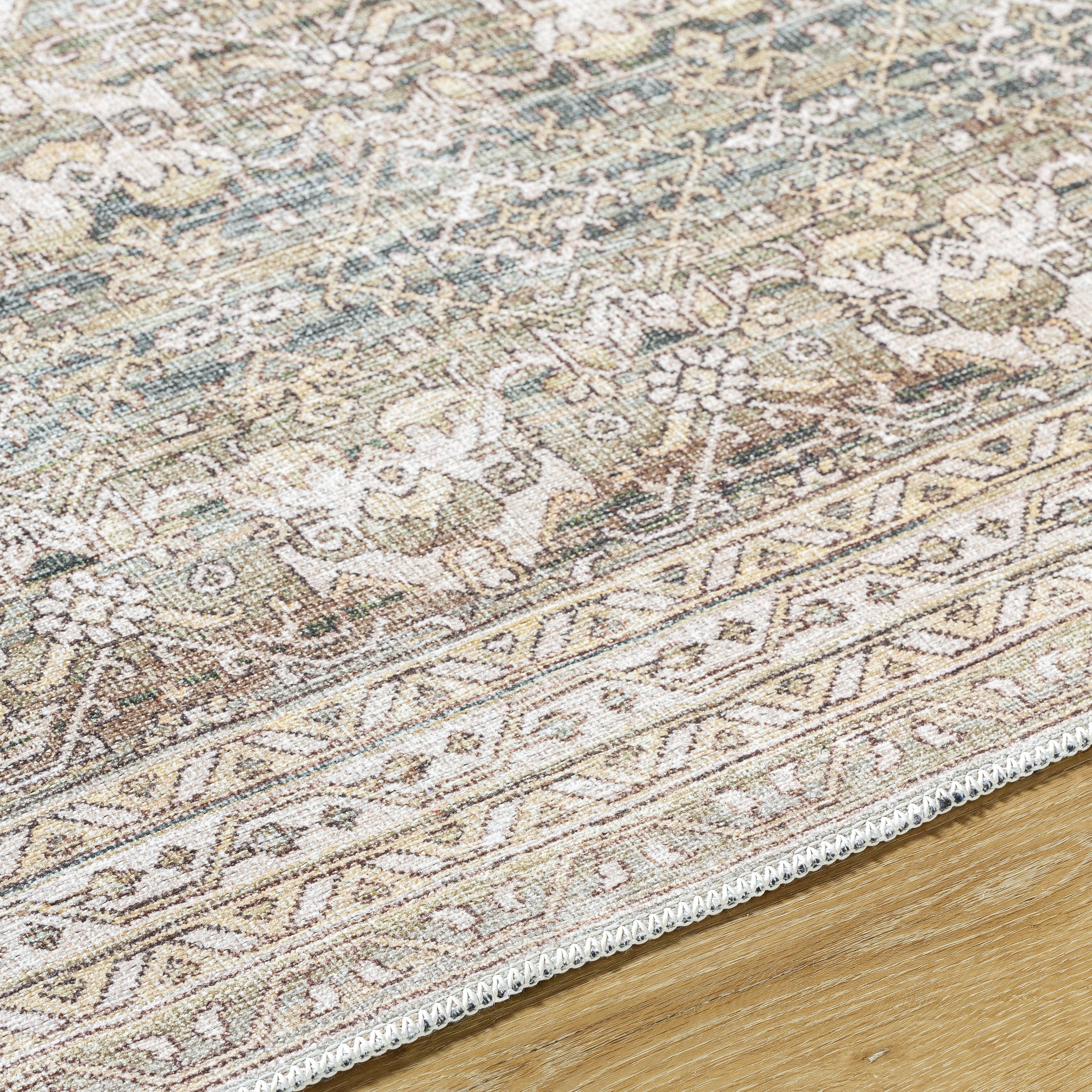 Amelie Green Indoor 8'10" x 12' Machine Woven Rug - Image 1