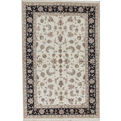 One-of-a-Kind Elegance Hand-Knotted Ivory 6' x 9' Wool Area Rug - Image 0