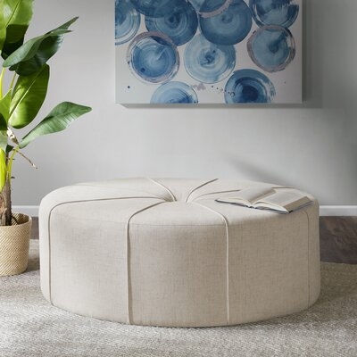 Christopher 48.5" Wide Tufted Oval Cocktail Ottoman, Cream - Image 1