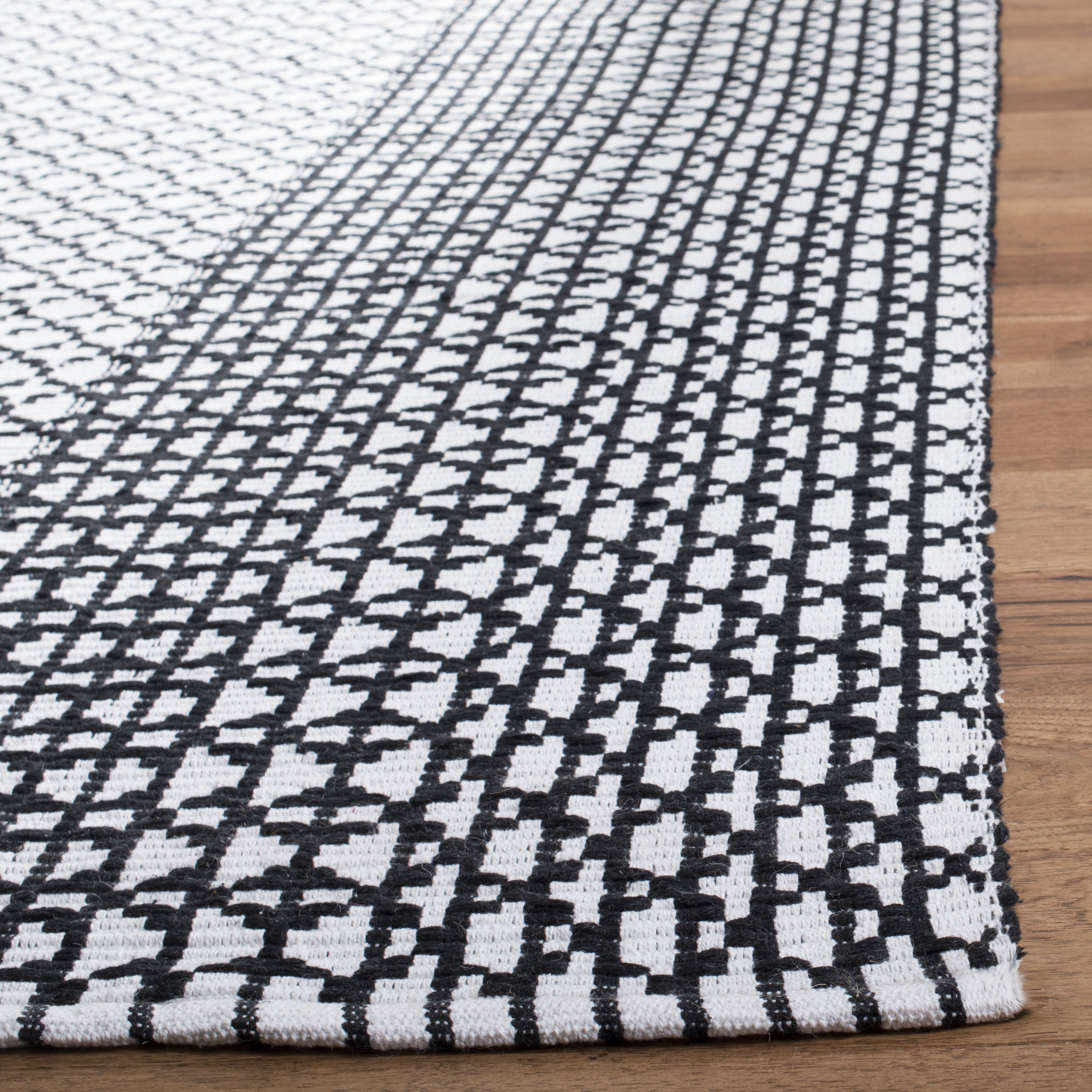 Arlo Home Hand Woven Area Rug, MTK617Z, Black/Ivory,  5' X 8' - Image 2