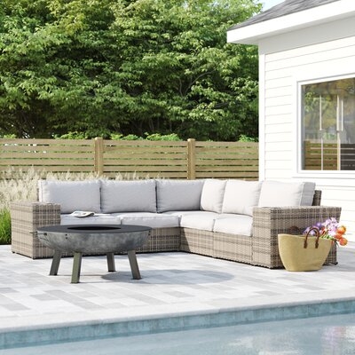 Buckworth 102" Wide Outdoor Wicker Symmetrical Patio Sectional with Cushions - Image 0