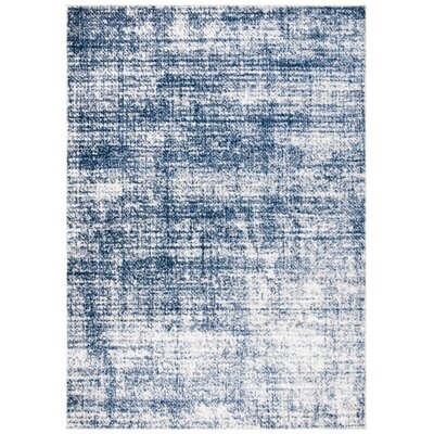 Abstract Ivory / Navy Area Rug - Image 0