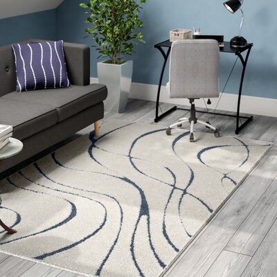 Stacie Abstract Cream/Blue Area Rug - Image 0