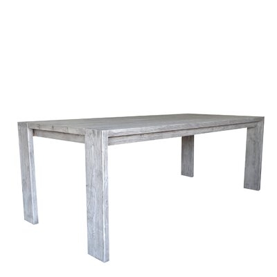 Kriszara Solid Wood Dining Table - Image 0