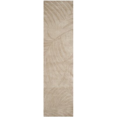 Palmnue Hand-Hooked Brown Area Rug - Image 0