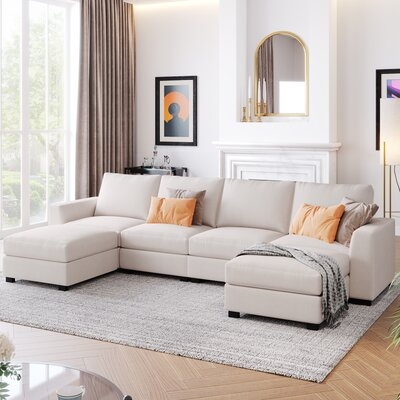 130.7" Wide Reversible Modular Sofa & Chaise With Ottoman - Image 0
