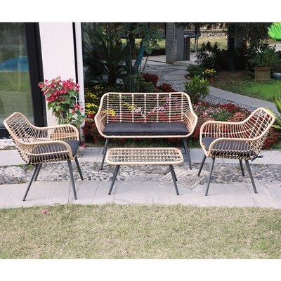 Andresen 4 Piece Rattan Sectional Seating Group with Cushions - Image 0