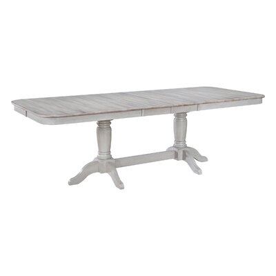 Fulks Extendable Rubberwood Solid Wood Dining Table - Image 0