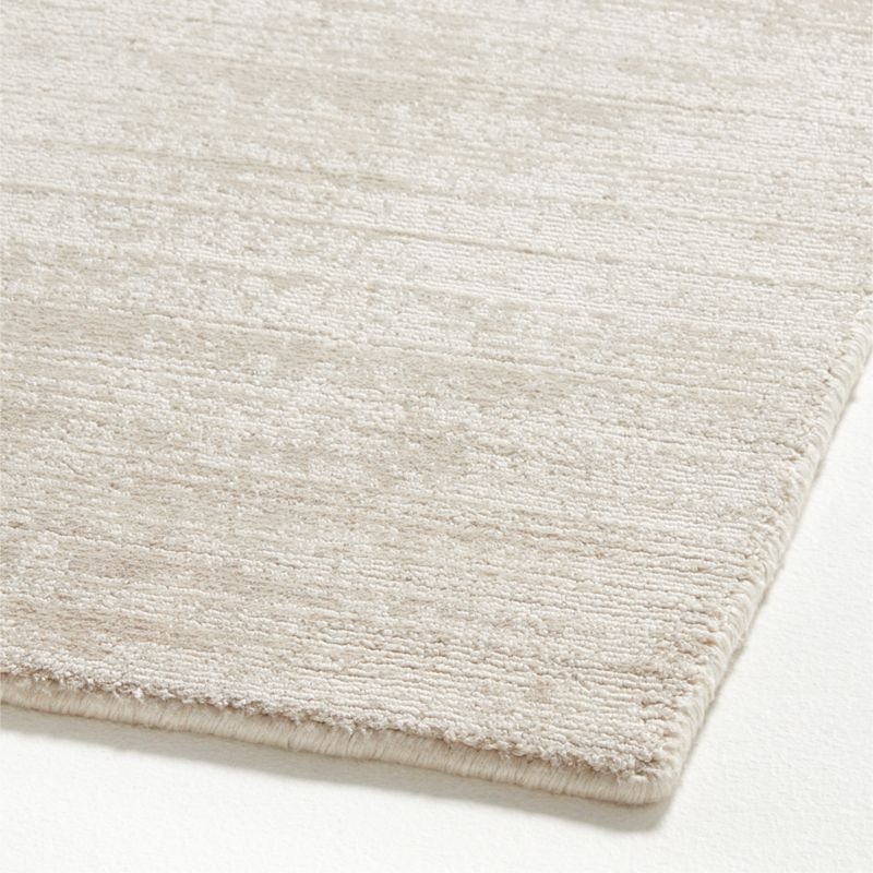 Laval Viscose Handwoven Solid Ivory Area Rug 6'x9' - Image 1