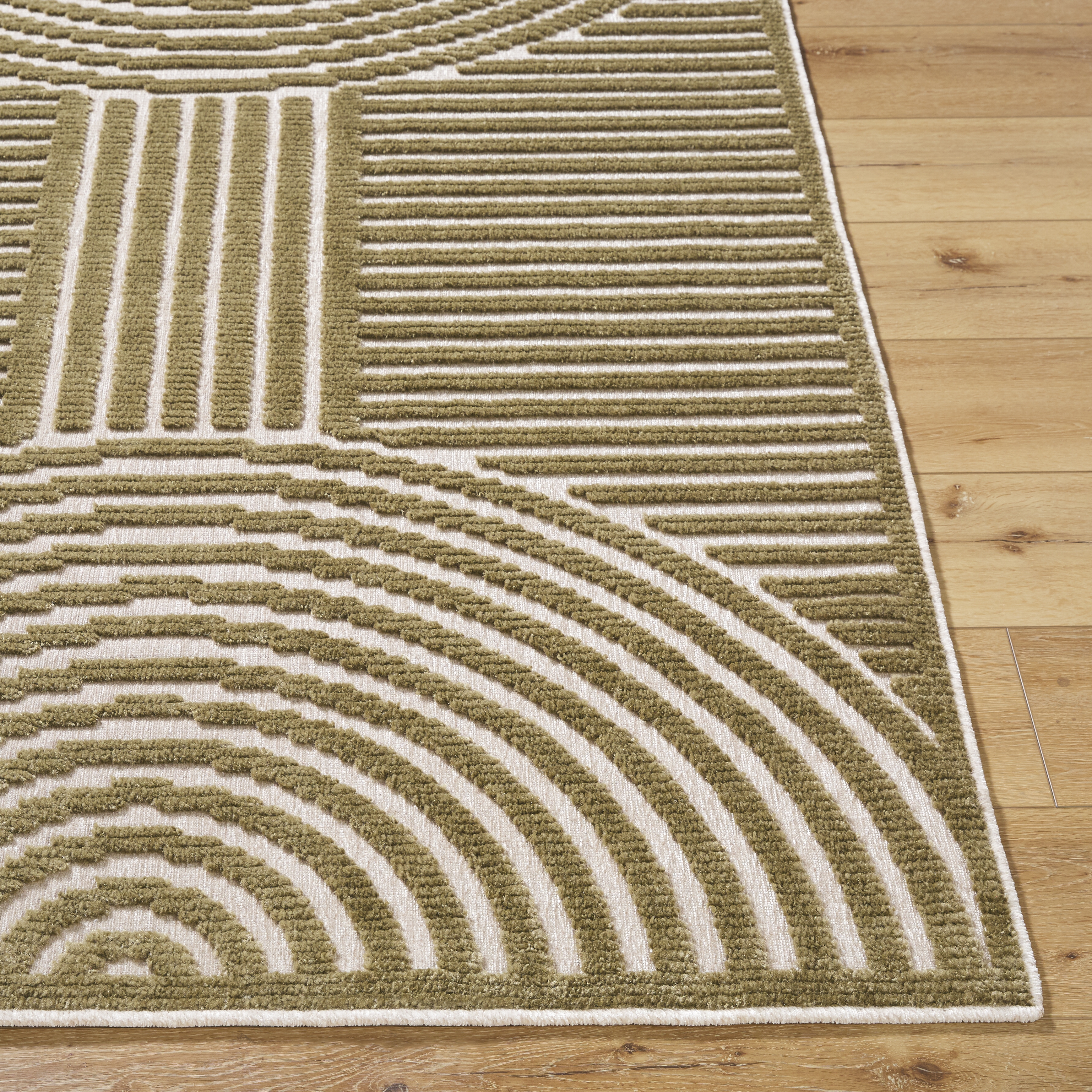 Lyna Brown Indoor 5' x 7'2" Machine Woven Rug - Image 1