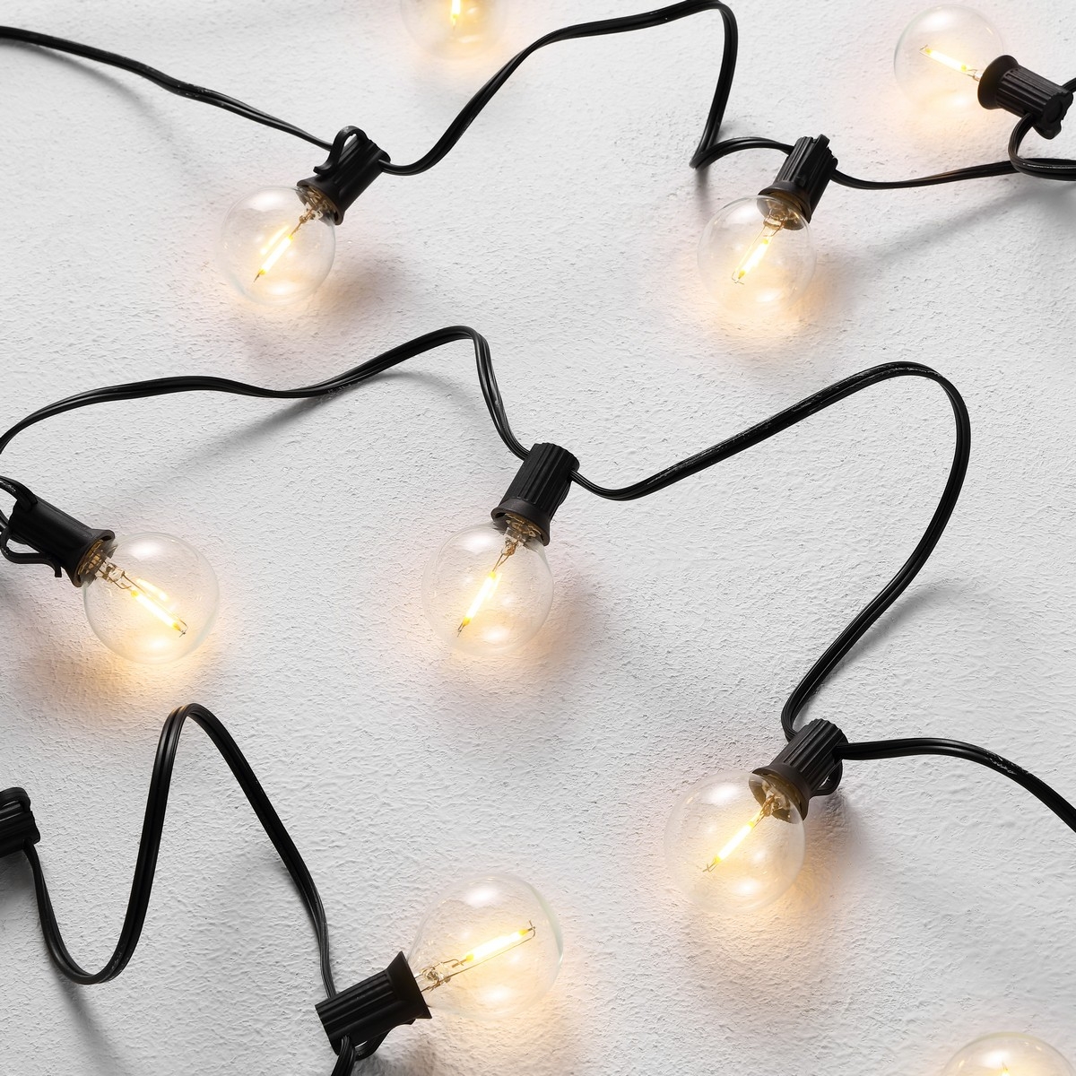 Jenica Outdoor String Lights - Black - Safavieh - Image 2