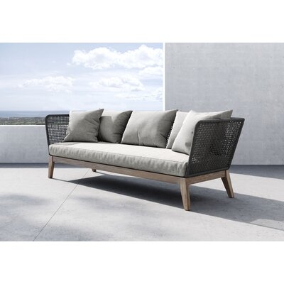 Bentson 90" Wide Outdoor Eucalyptus Patio Sofa with Cushions - Image 0