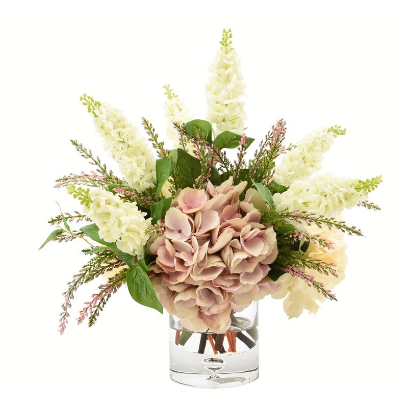Hydrangea and Lilac Floral Arrangement and Centerpiece in Glass Vase - Image 0