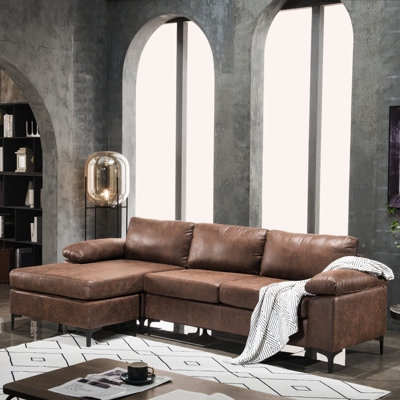 Haroldine 100.78" Wide Faux Leather Reversible Modular Sofa & Chaise - Image 0