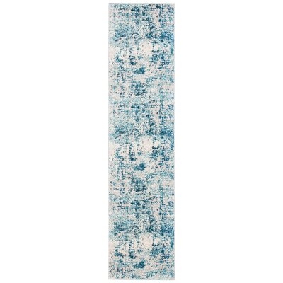 Lunenberg Abstract Ivory/Turquoise Area Rug - Image 0