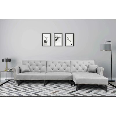 Fresquez 115" Reversible Sleeper Sofa & Chaise Sectional - Image 0