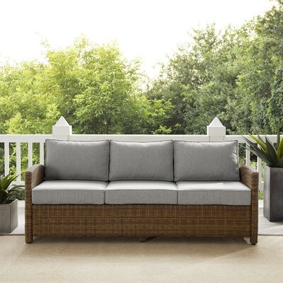 Bradenton 80.5" Wide Outdoor Wicker Patio Sofa with Cushions - Image 0
