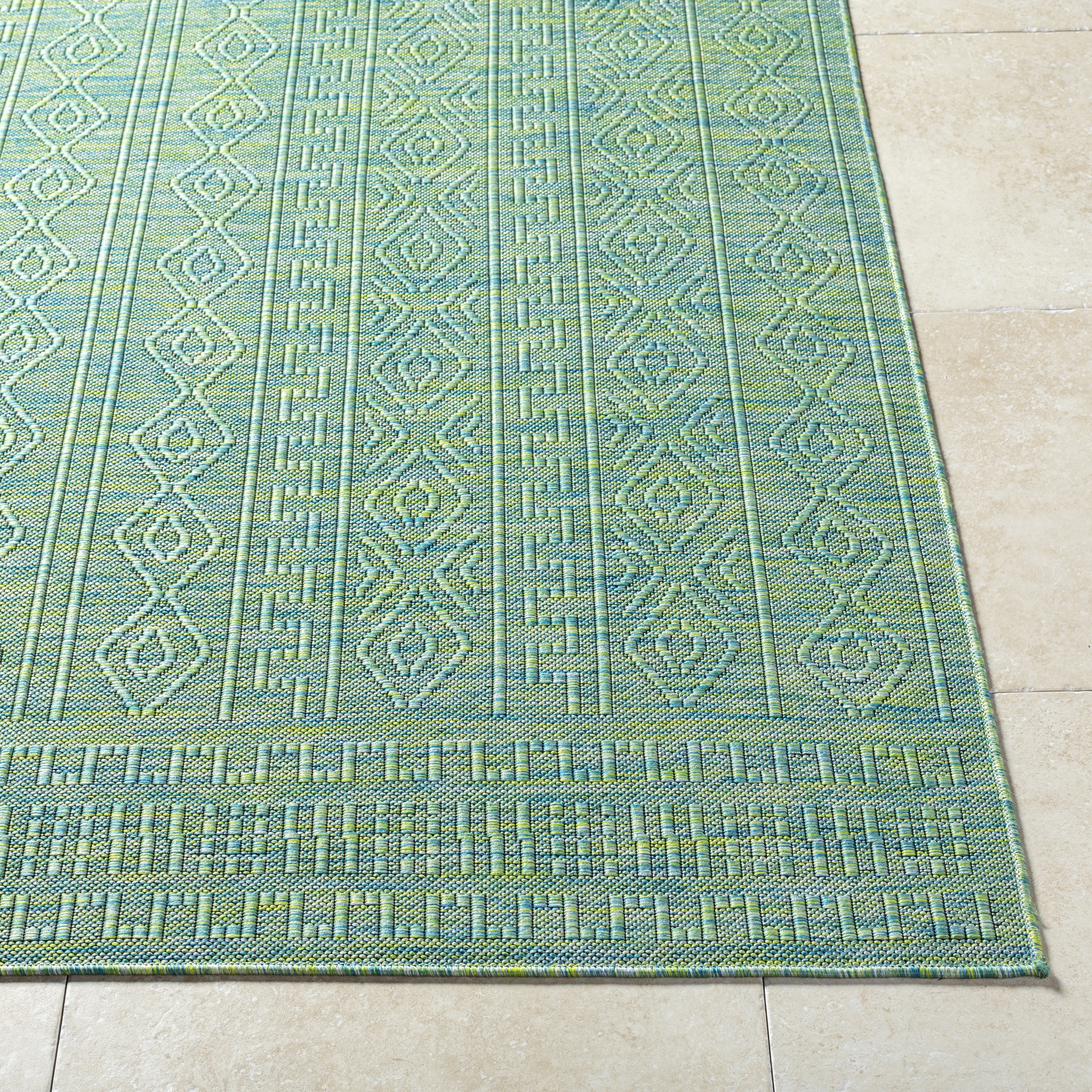 Terrace Green Outdoor 9'2" x 12' Machine Woven Rug - Image 1