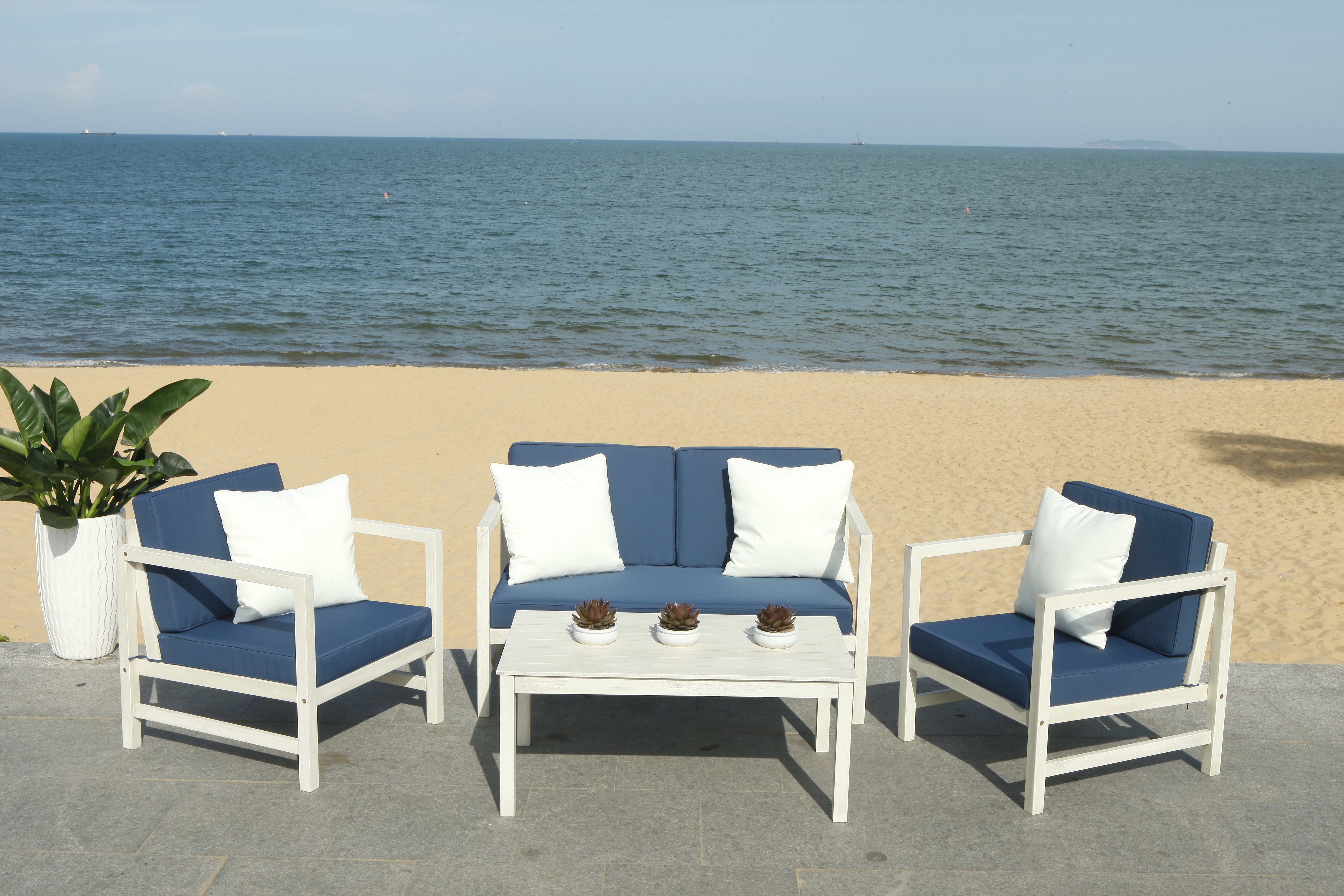 Montez 4 Piece Outdoor Set With Accent Pillows - White/Navy - Safavieh - Image 1
