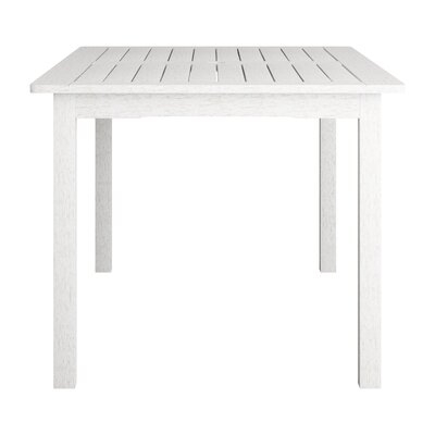 Red Barrel Studio® 9A794831E7B948F1A065A638A0B0967F Katishia Whitewashed Hardwood Outdoor Dining Table - Image 0