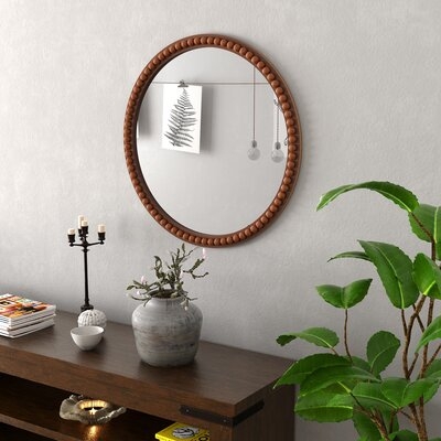 Aponi Round Wood Framed Wall Mounted Accent Mirror in Brown - Image 1