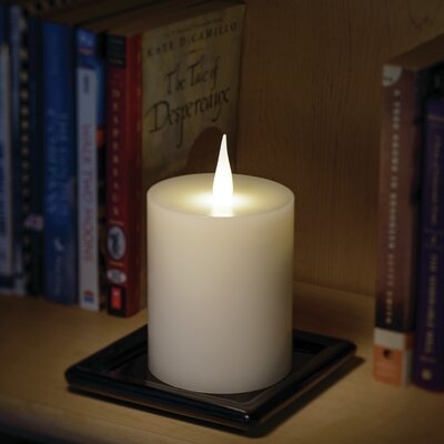 Warm LED Jumping Unscented Flameless Candle - Image 0