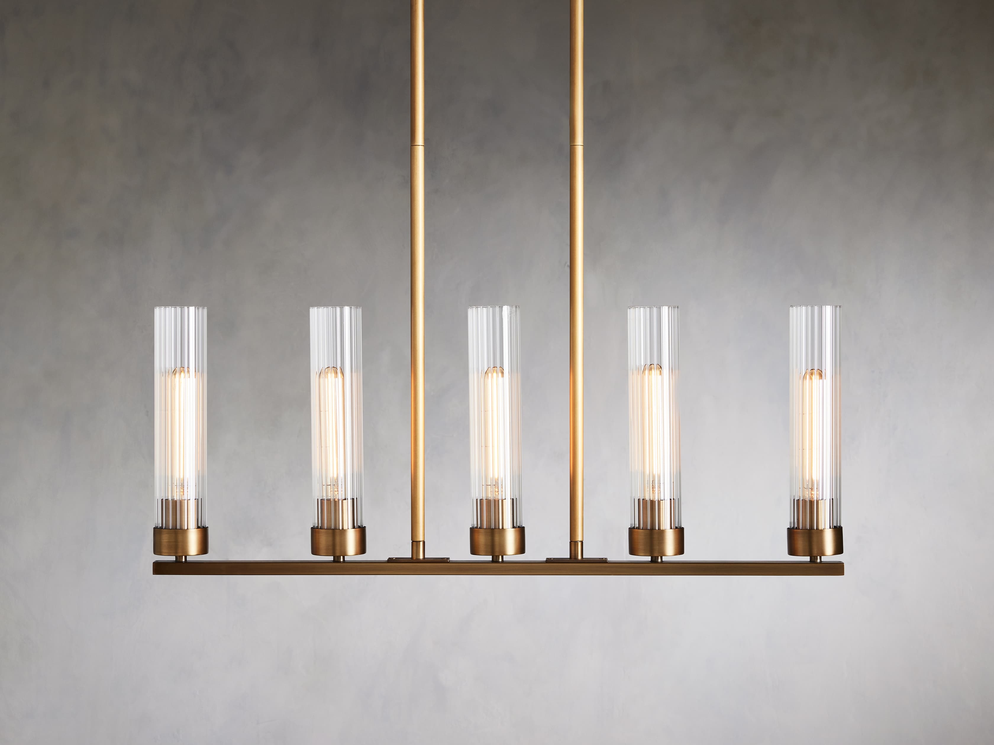 Andreas 5-Light Linear Chandelier in Glass Brass - Image 0