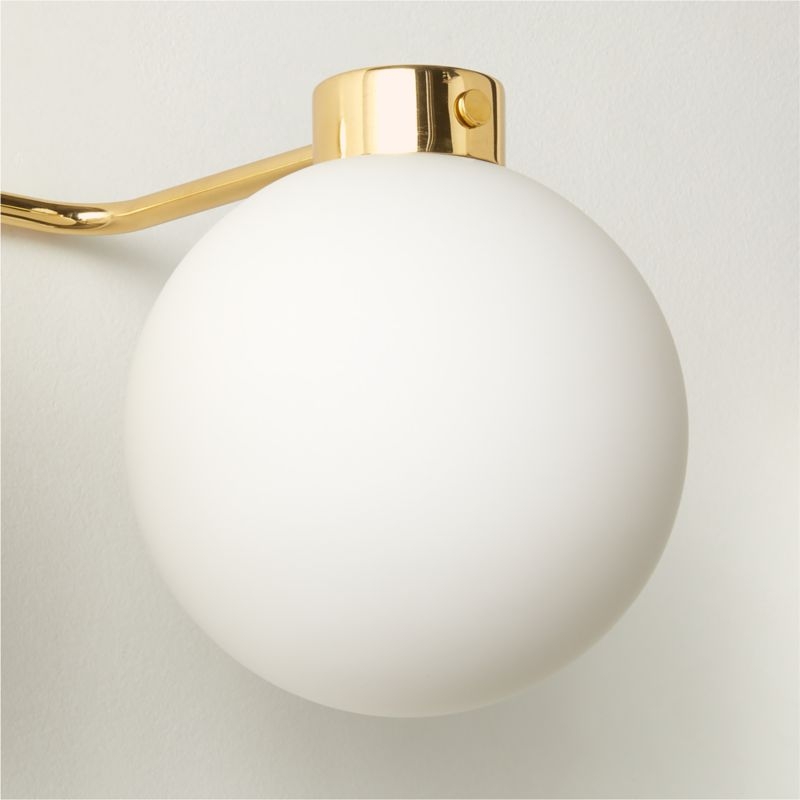 Marra 3-Light Polished Unlacquered Brass Globe Vanity Light - Image 2