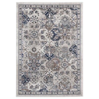 Taba Floral Ivory Area Rug - Image 0