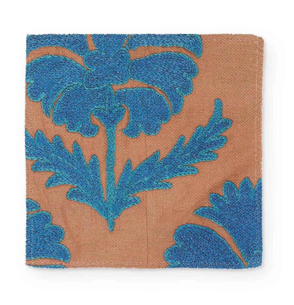 Turquoise Daisy Suzani Fabric by St. Frank | Blue | Printed Width: 54" WPattern Size: 27" W x 45" VFabric Direction: Up The Roll, Vertical Sold by the yard in continuous rolls Dye lots may vary. As a result, there may be slight color variations between yo - Image 0