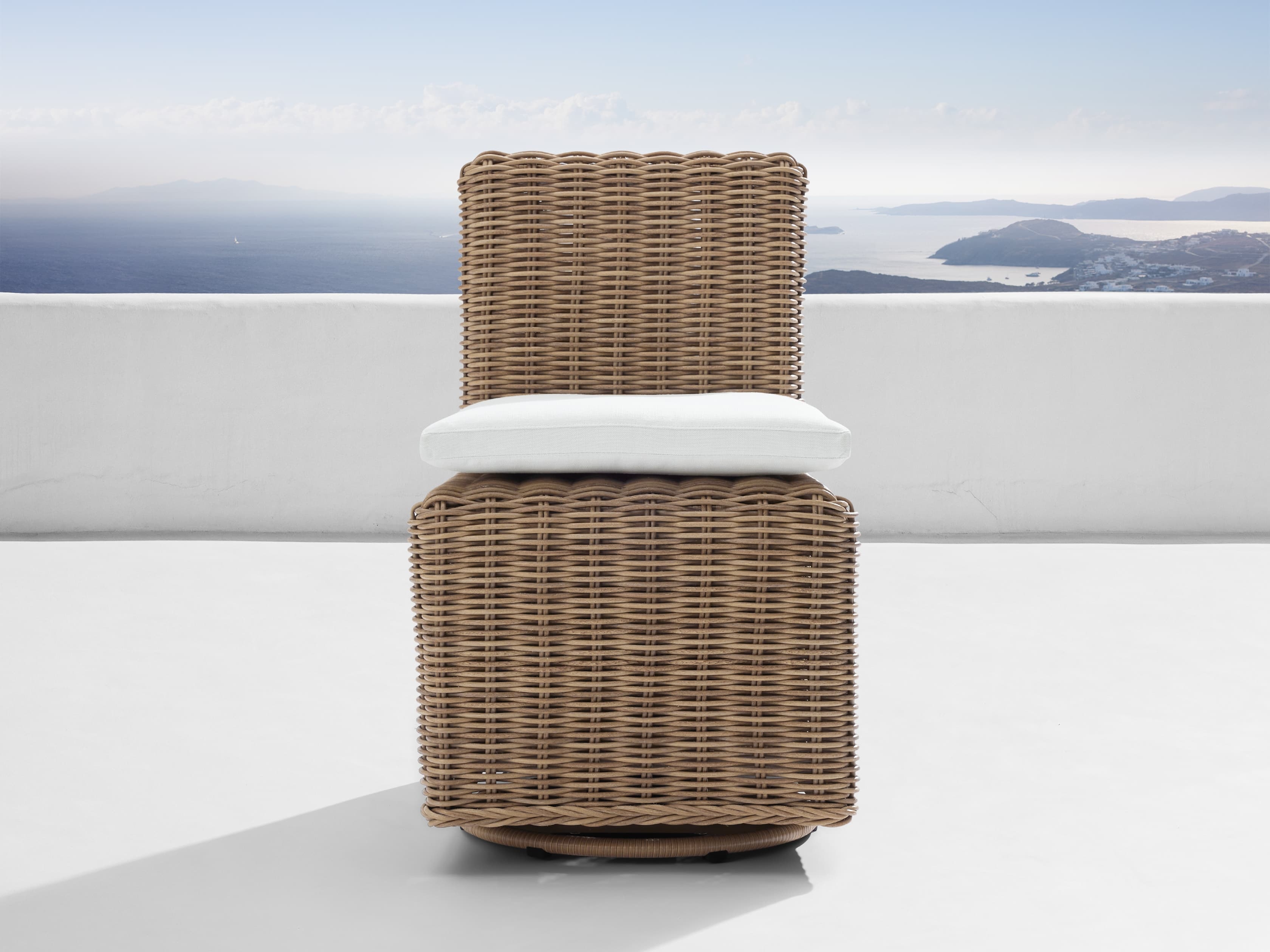 Montauk Outdoor Swivel Dining Side Chair in All Weather Wicker White  Weathered Natural/Starboard Snow - Image 0