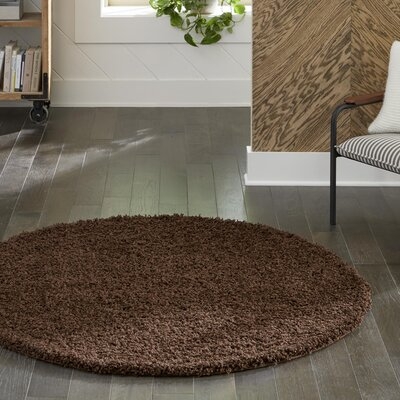 Freemont Chocolate Brown Area Rug - Image 0