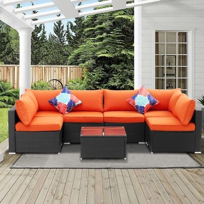 Ingraham 7 Piece Rattan Sectional Seating Group with Cushion - Image 0