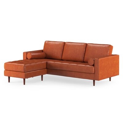 Ainslee Leather Reversible Modular Sectional with Ottoman - Image 0