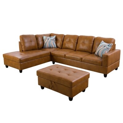 Eshaun 103.5" Wide Faux leather Sofa & Chaise with Ottoman - Image 0