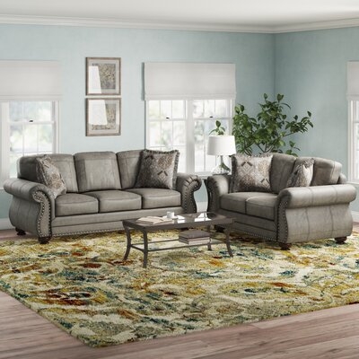 Macalla Faux Leather Living Room Set - Image 0