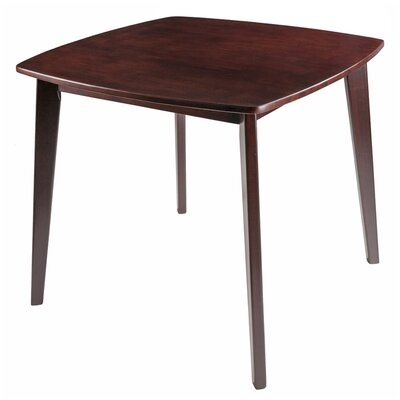 Jaidon 34.02" Solid Wood Dining Table - Image 0
