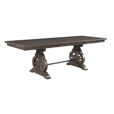 Kenworthy Counter Height Extendable Trestle Dining Table - Image 0
