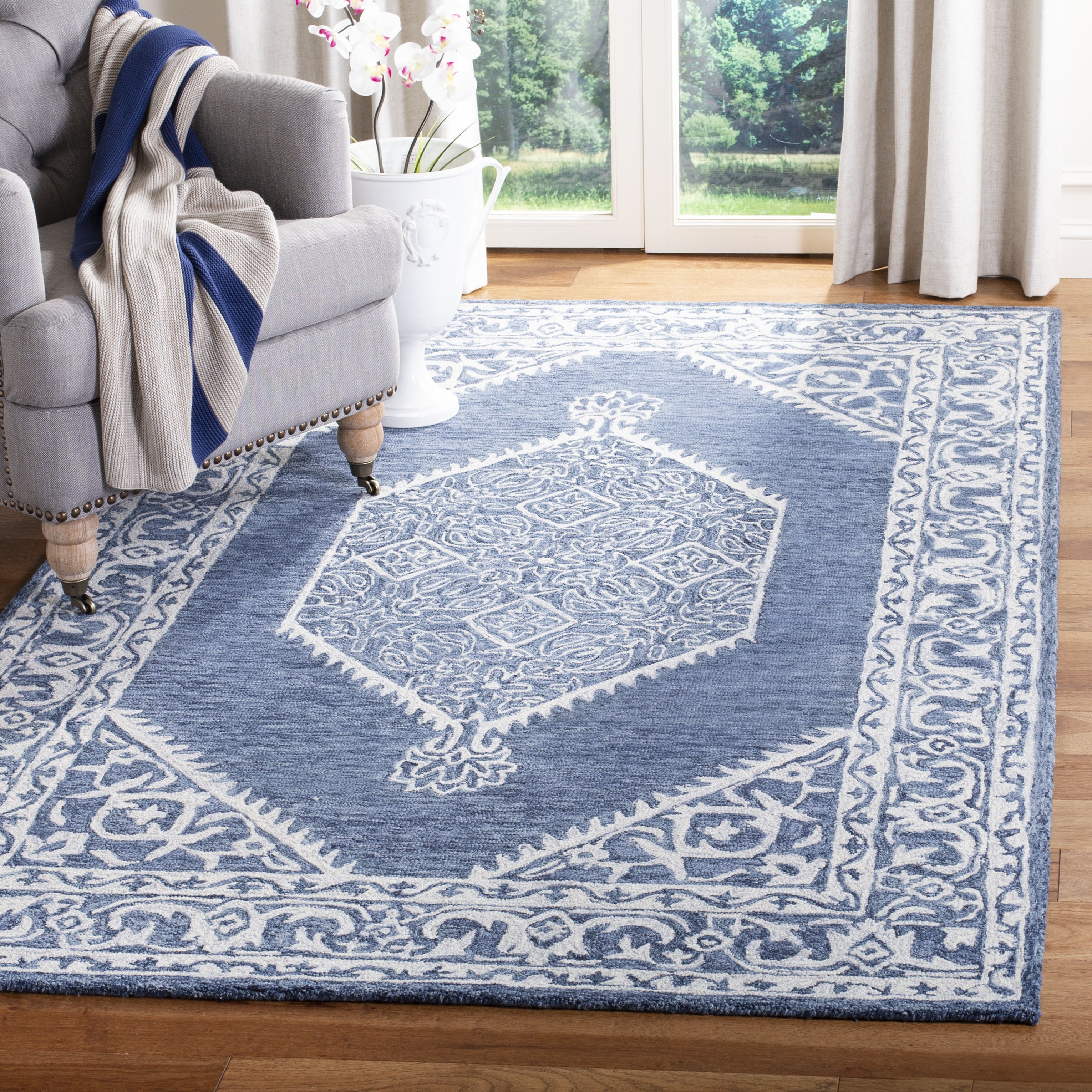 Arlo Home Hand Tufted Area Rug, MLP605M, Blue/Ivory,  5' X 8' - Image 1