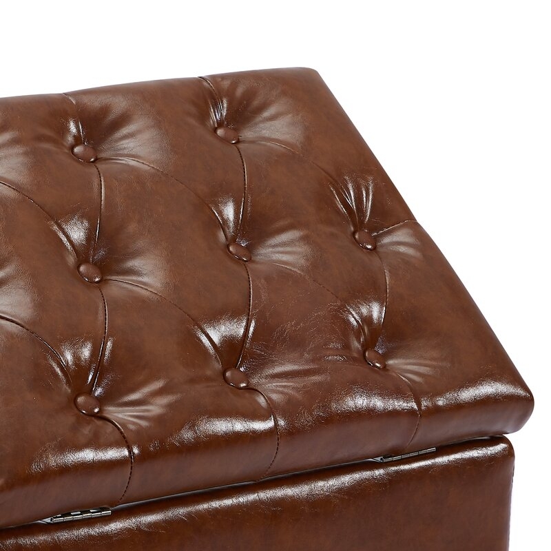Eisenberg 24'' Wide Faux Leather Tufted Rectangle Storage Ottoman with Storage, Dark Brown (Dark Brown or tan?) - Image 1