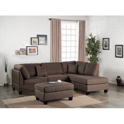 Jandel 104" Wide Reversible Corner Sectional with Ottoman - Image 0