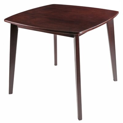 Straka 34.02" Solid Wood Dining Table - Image 0