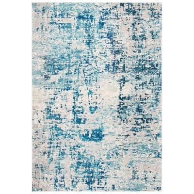 Lunenberg Abstract Ivory/Turquoise Area Rug - Image 0