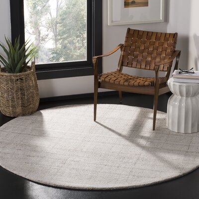 Gaten Handmade Tufted Ivory Area Rug - Image 0