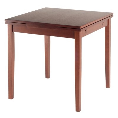 Caballo 29.92" Extendable Solid Wood Dining Table - Image 0