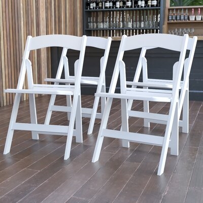 Thornfeldt Vinyl Padded Folding Chair - Image 0